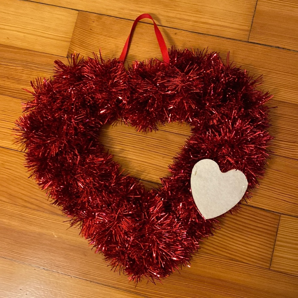 Valentine’s Day wreath made with a vibrant red tinsel